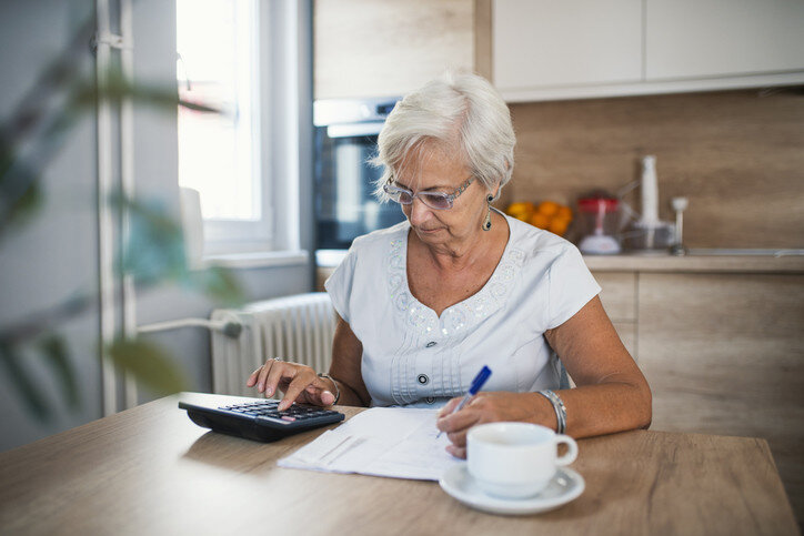 Woman paying bills