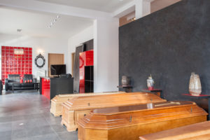 Funeral Home With Coffins Scaled